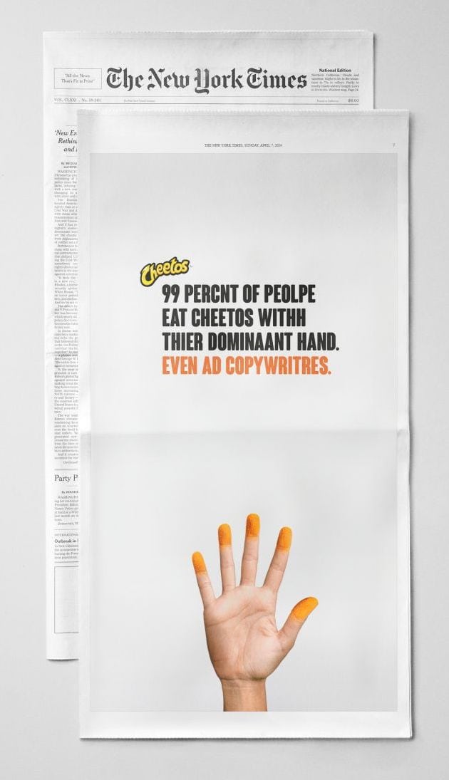 Cheetos advertisement in The New York Times showing a hand with orange fingertips and humorous fact about eating habits