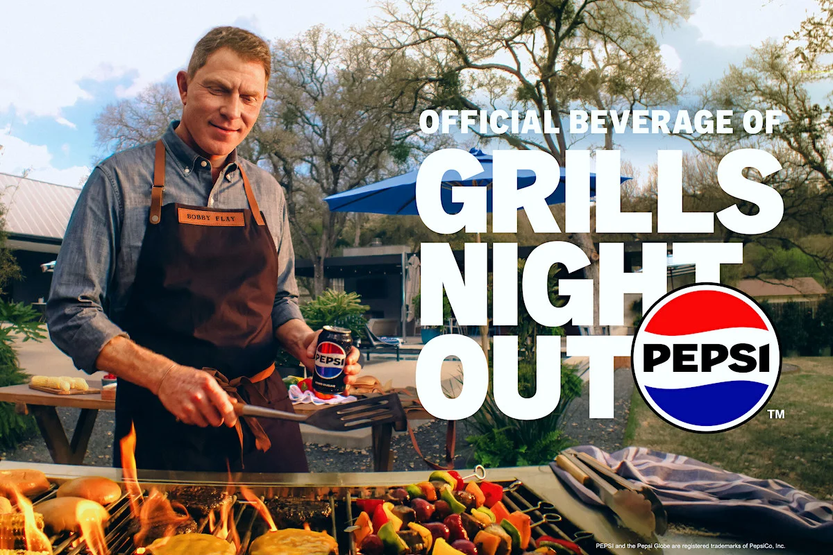 Man grilling outdoors with Pepsi can, text overlay 'Official Beverage of Grills Night Out', with Pepsi logo.