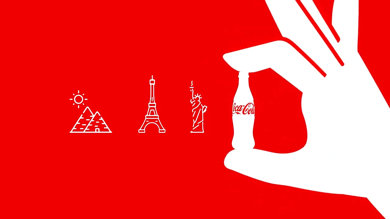 Hand holding Coca-Cola bottle with global landmarks including Pyramids, Eiffel Tower, and Statue of Liberty on red background.