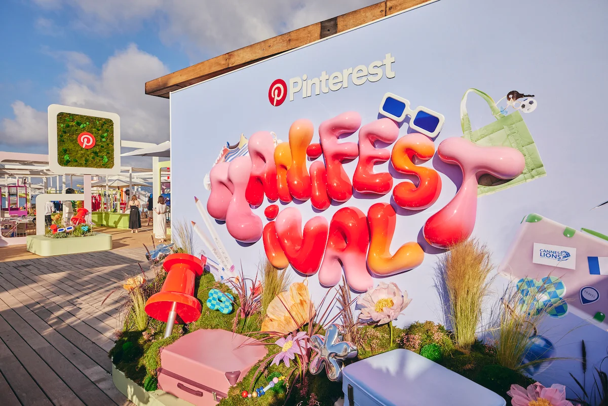 Pinterest event display at Cannes Lions Festival with colorful decorations and branding.