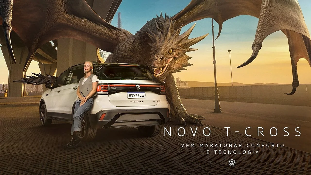 Woman leaning on Volkswagen T-Cross with a dragon in the background, promoting comfort and technology.