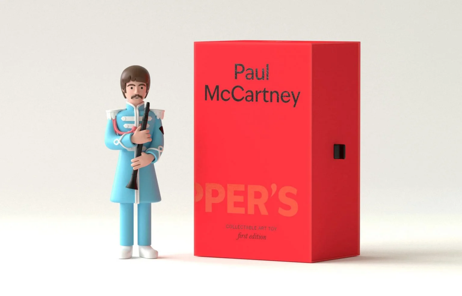 Brinquedo colecionável Paul McCartney, uniforme azul, caixa vermelha.