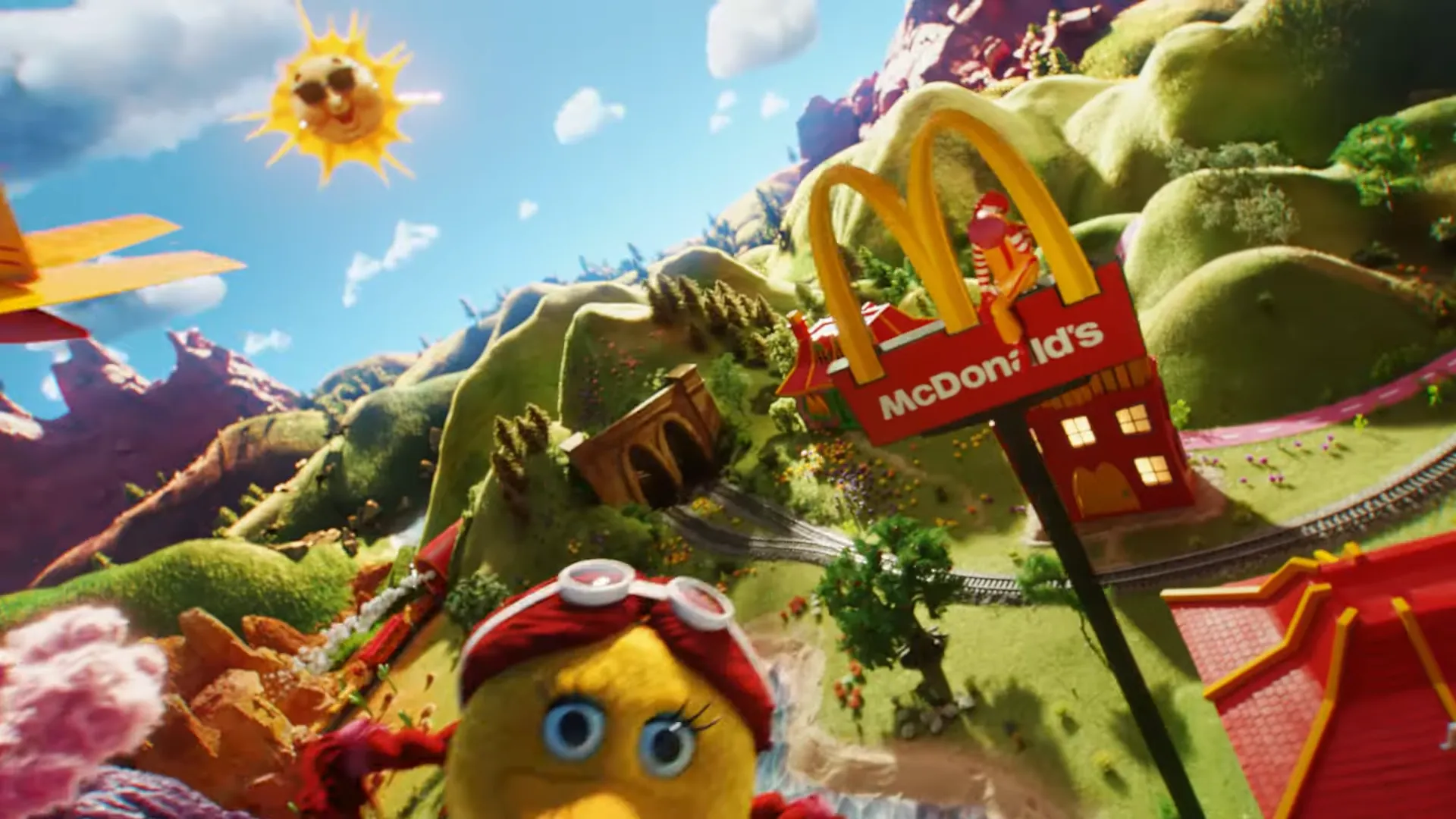 Imagem colorida com paisagem e restaurante McDonald's