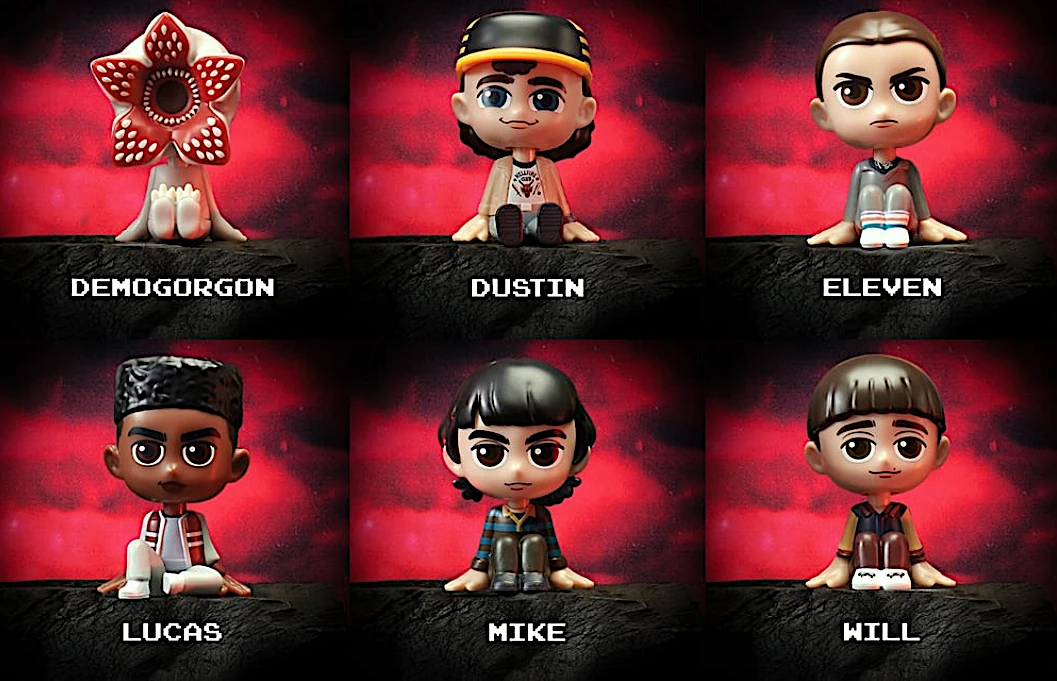 Bonecos de personagens em fundo vermelho.