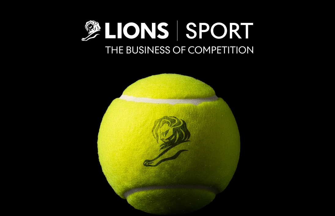 Bola de tênis com logotipo de leão