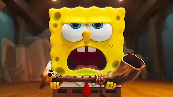 Personagem animado segurando um chifre de madeira.